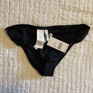 NWT Trina Turk black bikini bottom. Size 4.